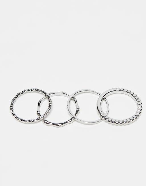 DESIGN Pack Of 12 Rings With Twist Details And Engraved Designs In Silver Tone