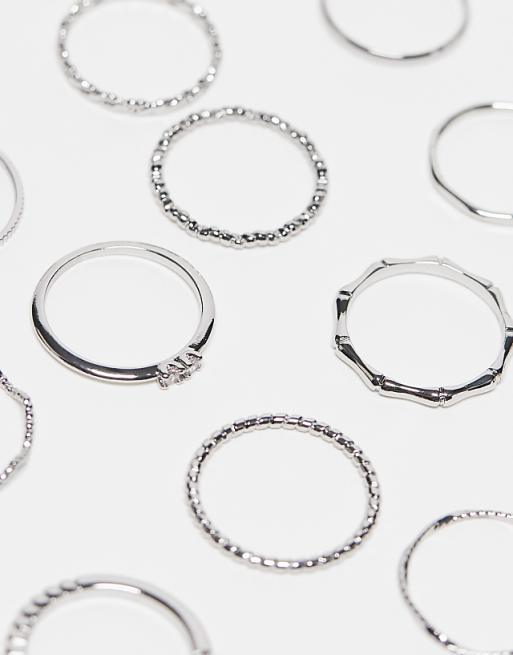 DESIGN Pack Of 12 Rings With Twist Details And Engraved Designs In Silver Tone