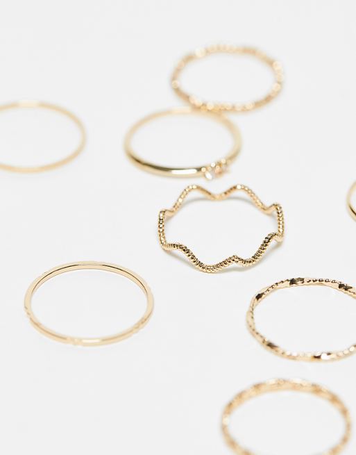 DESIGN Pack Of 12 Rings With Twist Details And Engraved Designs In Gold Tone