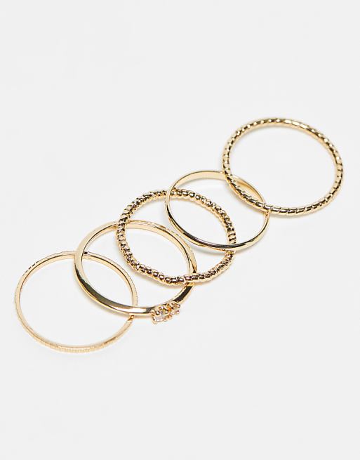 DESIGN Pack Of 12 Rings With Twist Details And Engraved Designs In Gold Tone