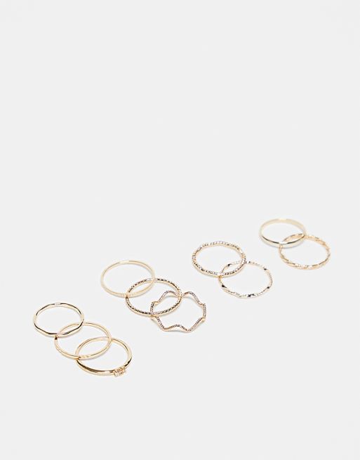 DESIGN pack of 12 rings with twist details and engraved designs in gold tone
