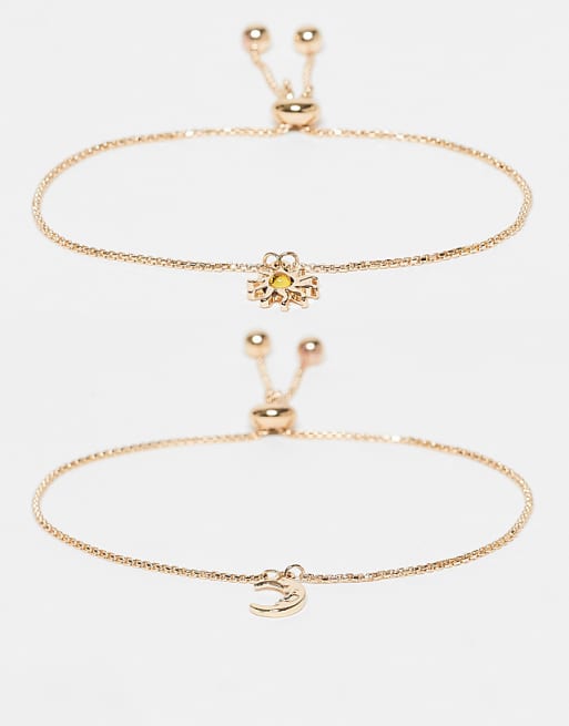 DESIGN pack of 2 bracelets with sun and moon charms in gold tone
