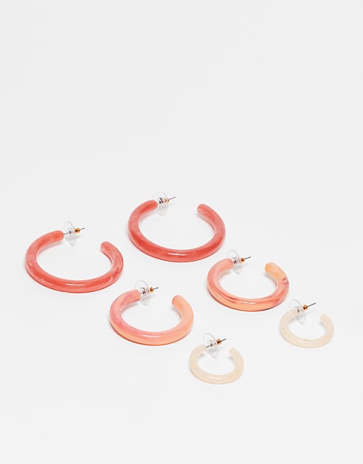 DESIGN pack of 3 resin hoops in graduating sizes in peachy pink tones