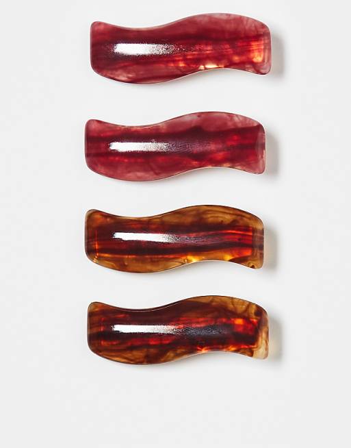 DESIGN pack of 4 hair slides with wavy resin design