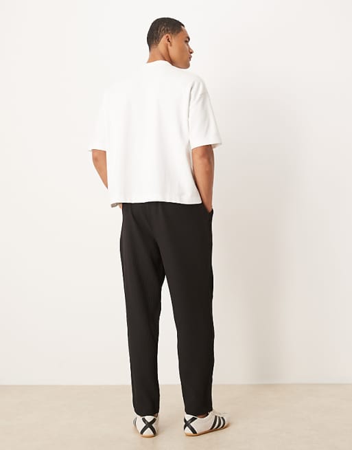 DESIGN Plisse Tapered Trousers In Black