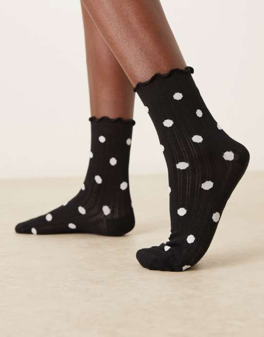 DESIGN Polka Dot Socks With Frill Trim In Black And White