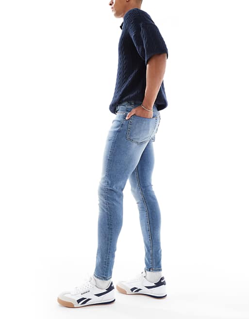 DESIGN Power Stretch Jeans In Mid Wash Blue