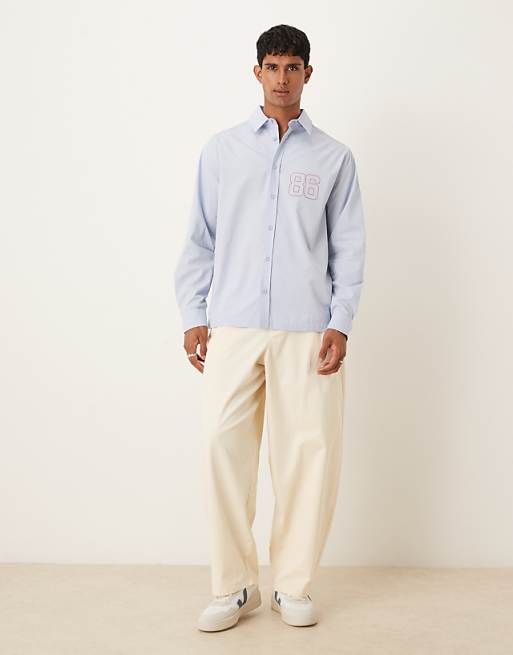DESIGN Relaxed Fit Long Sleeved Shirt With Print Detail In Blue Poplin