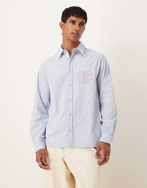 DESIGN Relaxed Fit Long Sleeved Shirt With Print Detail In Blue Poplin