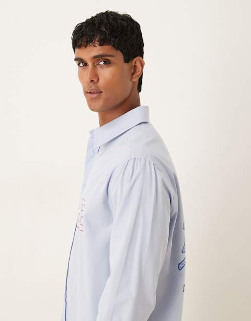 DESIGN Relaxed Fit Long Sleeved Shirt With Print Detail In Blue Poplin