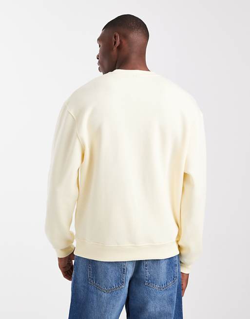 DESIGN Relaxed Fit Sweatshirt With Distressed Text Embroidery In Pale Yellow