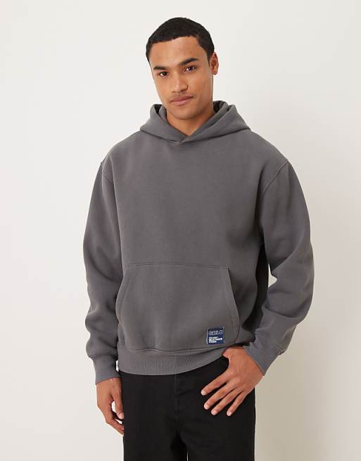 DESIGN relaxed hoodie with woven label in washed charcoal