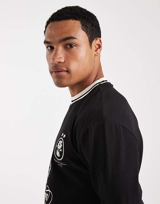 DESIGN Relaxed Long Sleeve T-shirt With Tipping Detail And Sports Graphic In Black