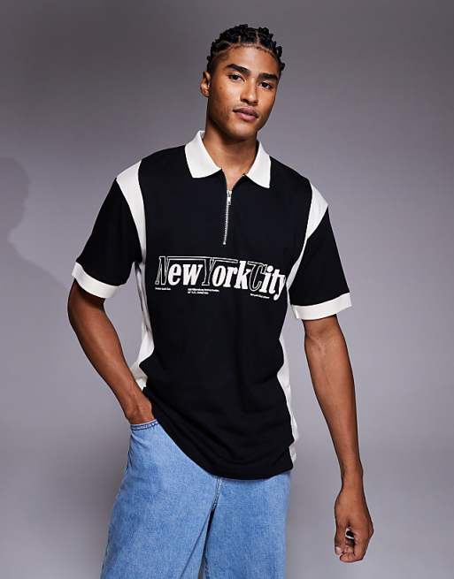 DESIGN relaxed polo with city graphic in black with panelling