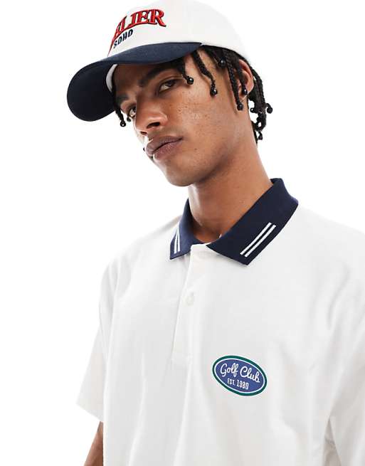 DESIGN relaxed polo with front golf graphic in white
