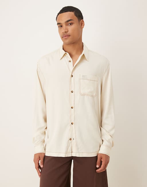 DESIGN relaxed shirt in cream with contrast stitching and badge detail