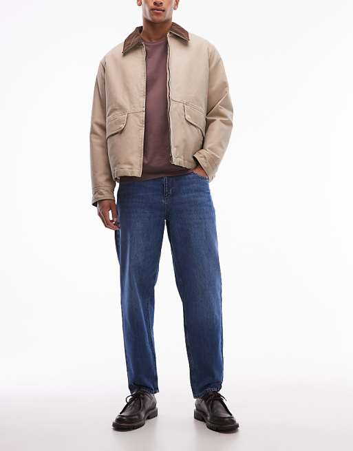 DESIGN relaxed tapered jeans in dark wash blue