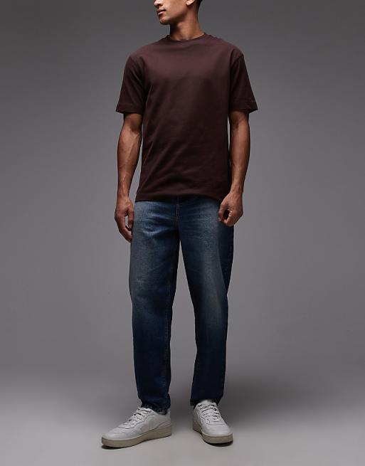 DESIGN relaxed tapered jeans in indigo