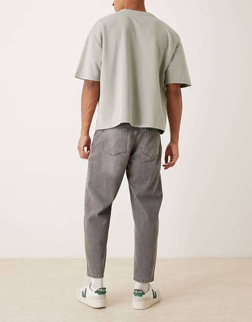 DESIGN Relaxed Tapered Jeans In Washed Black With Rips