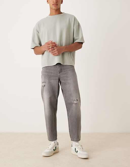 DESIGN relaxed tapered jeans in washed black with rips
