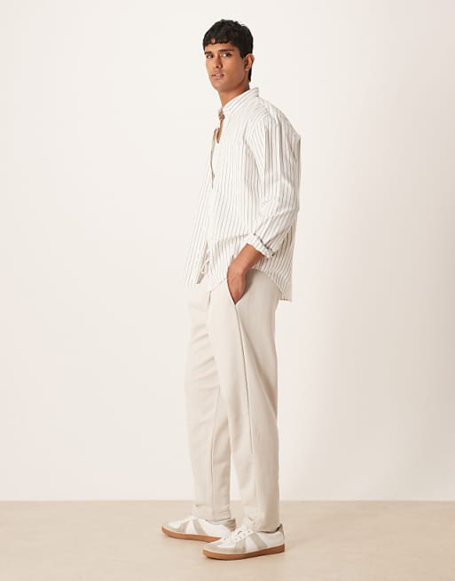 DESIGN Relaxed Tapered Joggers With Pleats In Stone