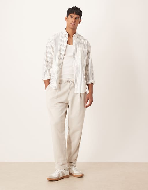 DESIGN relaxed tapered joggers with pleats in stone