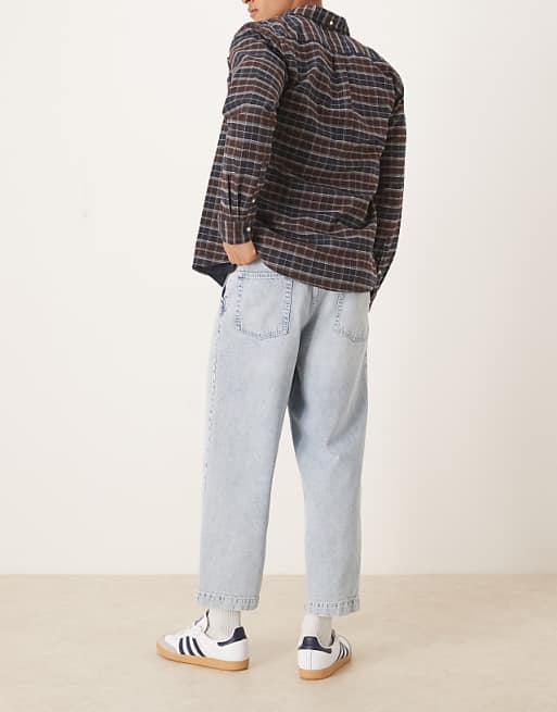 DESIGN Relaxed Tapered Pleated Jeans In Bleach Wash Denim