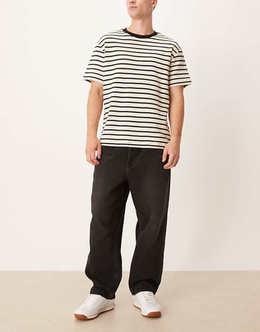 DESIGN Relaxed Tapered Pleated Jeans In Washed Black