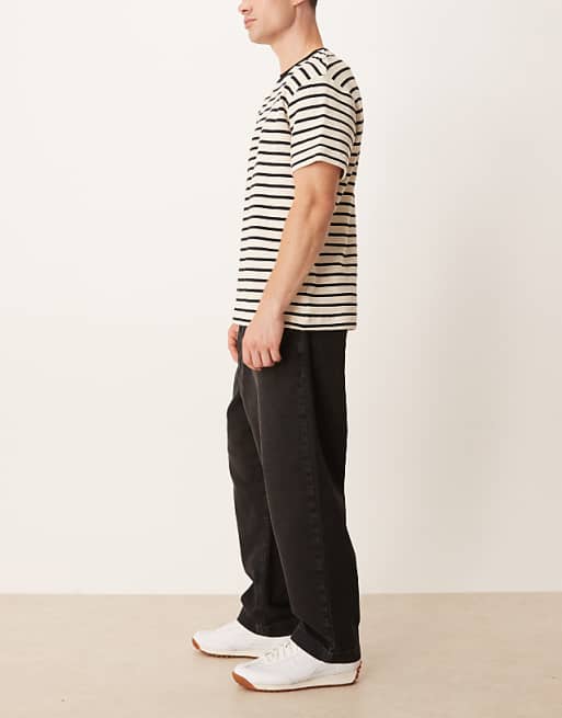 DESIGN Relaxed Tapered Pleated Jeans In Washed Black