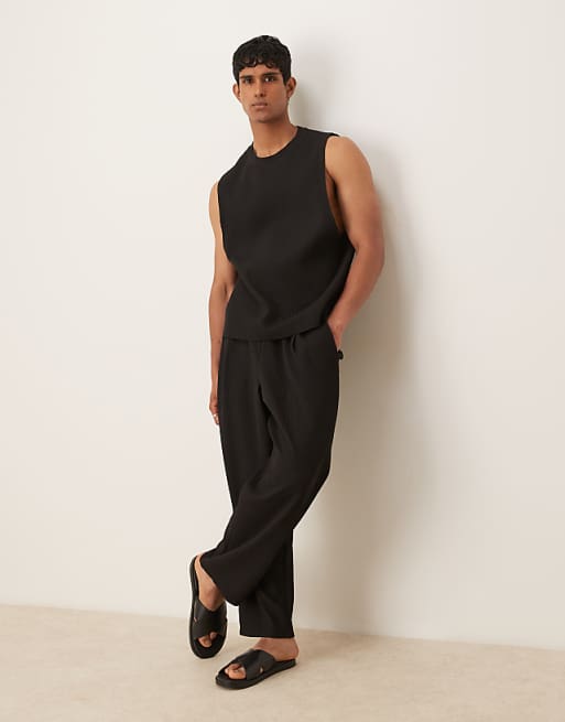 DESIGN Relaxed Tapered Plisse Joggers In Black