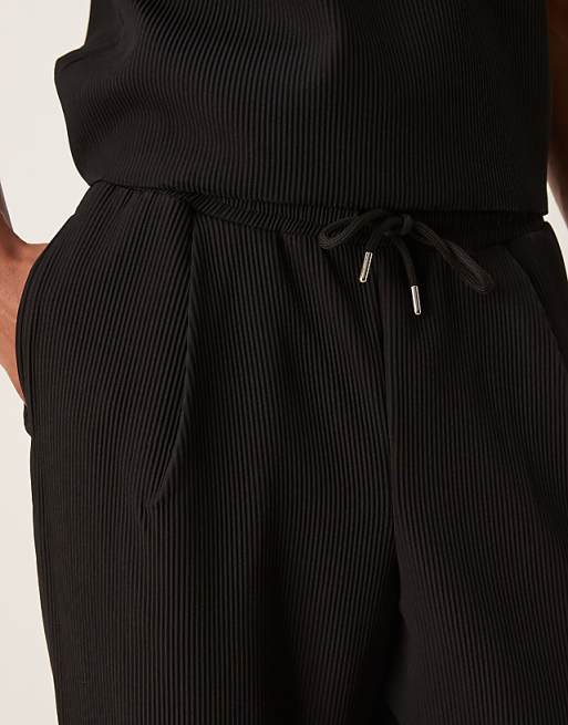 DESIGN Relaxed Tapered Plisse Joggers In Black