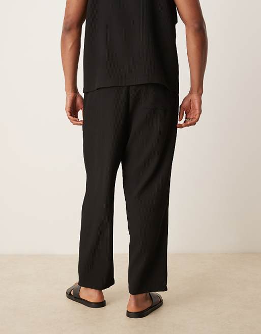 DESIGN Relaxed Tapered Plisse Joggers In Black