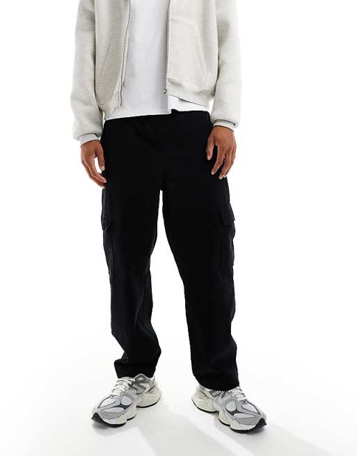 DESIGN Relaxed Tapered Pull On Cargo Trousers In Black With Pleats