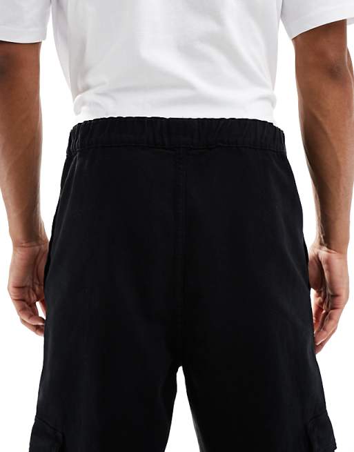 DESIGN Relaxed Tapered Pull On Cargo Trousers In Black With Pleats