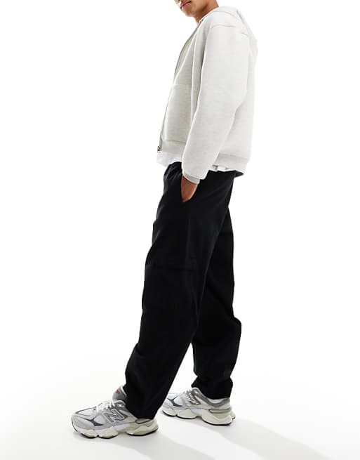 DESIGN Relaxed Tapered Pull On Cargo Trousers In Black With Pleats