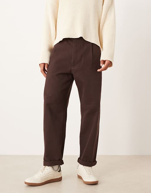 DESIGN relaxed tapered trousers in brown with rolled hem