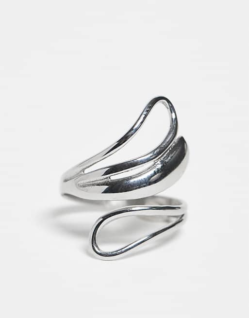 DESIGN ring with double loop wrap around design in silver tone