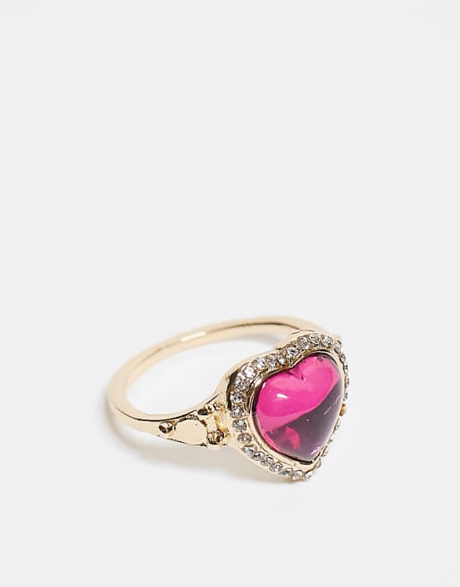 DESIGN ring with pink heart stone setting in gold tone