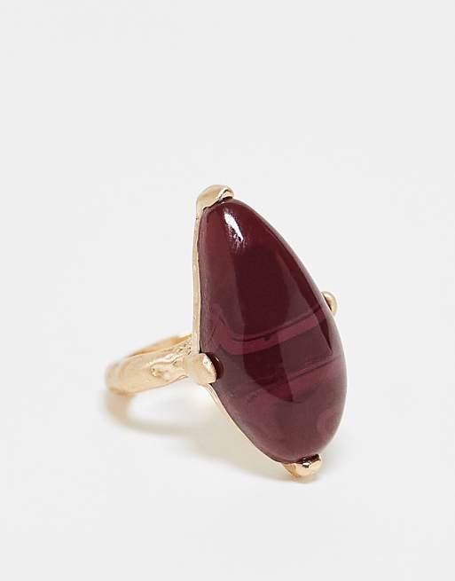DESIGN ring with semi precious stone set in brushed gold