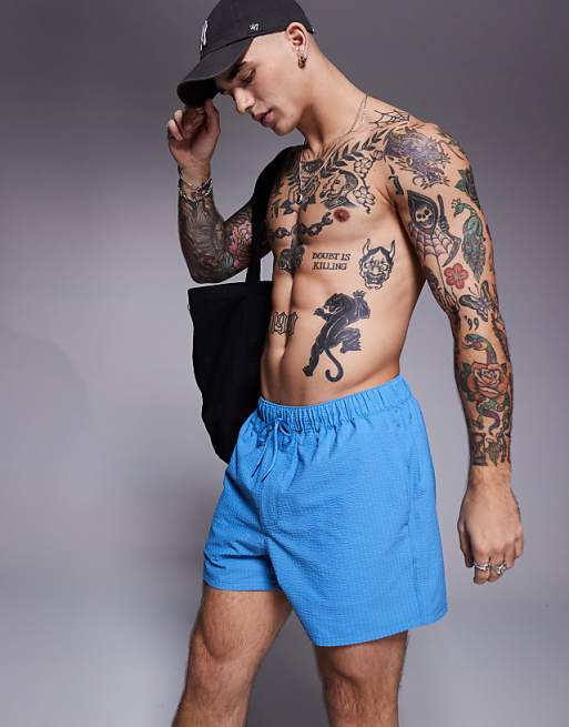 DESIGN seersucker swim shorts in short length in blue