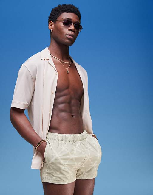 DESIGN seersucker swim shorts in super short length with tonal floral print in sage