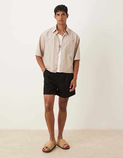 DESIGN Shorter Length Denim Short With Pleats In Black