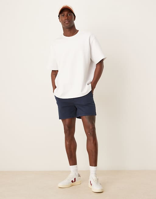 DESIGN Shorter Length Skinny Chino Shorts In Navy