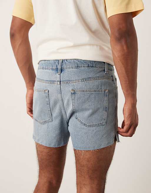 DESIGN Shorter Length Slim Denim Shorts With Rip Detail In Light Wash Blue