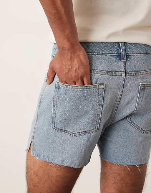 DESIGN Shorter Length Slim Denim Shorts With Rip Detail In Light Wash Blue