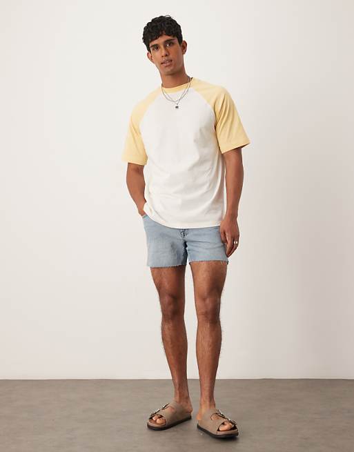 DESIGN shorter length slim denim shorts with rip detail in light wash blue