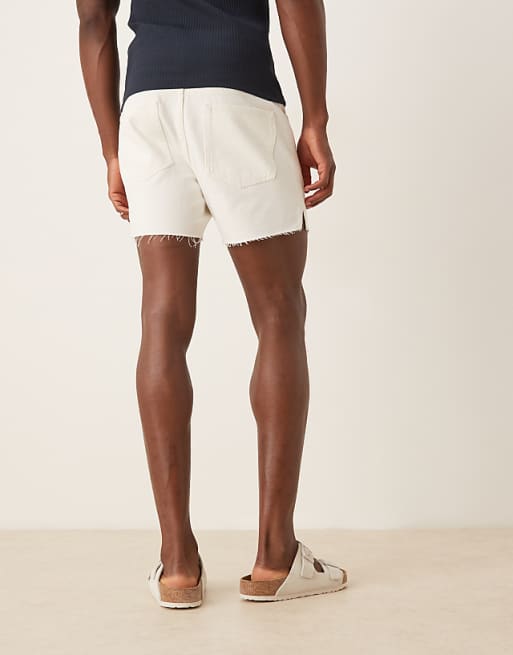 DESIGN Shorter Length Slim Denim Shorts With Rip Detail In White