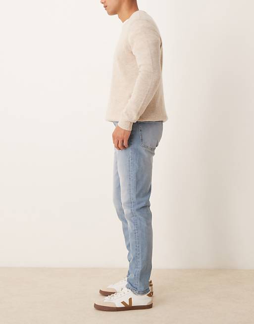 DESIGN Skinny Jeans In Light Wash Blue