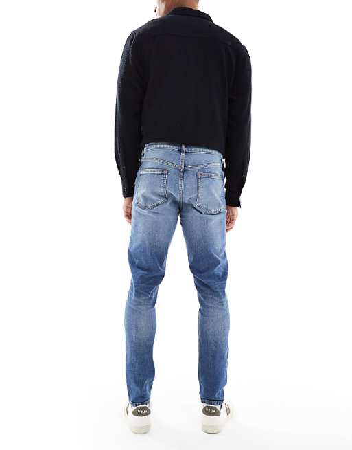 DESIGN Skinny Jeans In Mid Wash Blue