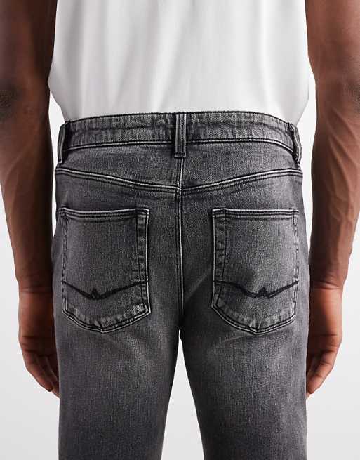 DESIGN Skinny Jeans In Washed Black